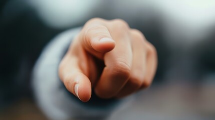Obraz premium Close-up shot of a finger pointing directly at the viewer, ideal for use in motivational content, recruitment ads, or social media campaigns emphasizing choice, personal engagement