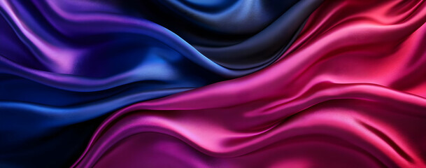 Fototapeta premium Elegant wave patterns of rich fabric showcasing vibrant shades of purple and pink, perfect for backgrounds and designs.