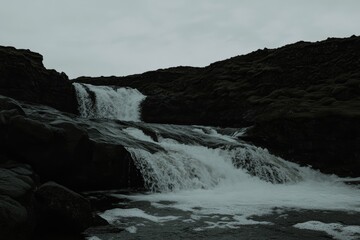 An island landscape with majestic skies and an eerie atmosphere.