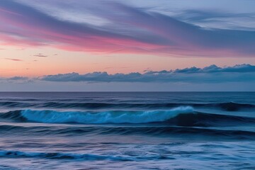 Obraz premium Serene Dusk Colors Over Ocean Waves on a Pure White Background