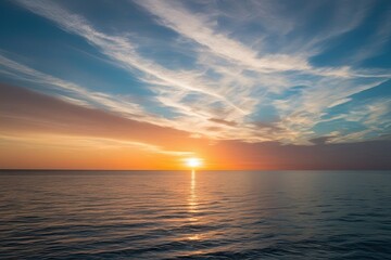Obraz premium Vibrant Sunrise Over Serene Ocean with Colorful Reflections