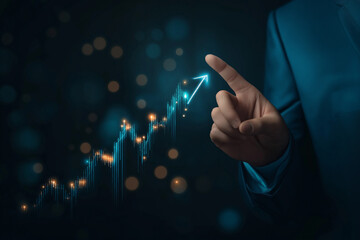 Businessman touching a growth arrow graph going upwards in the stock market, rising sales and value concept on a virtual screen background