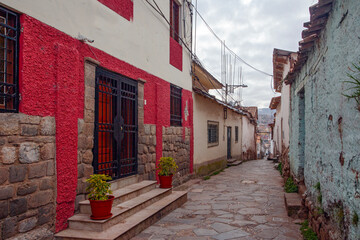 Ancient streets of Cuzco downtown, traditional stone buildings, Peru