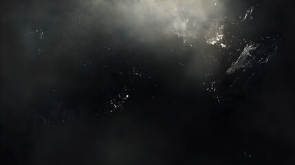 A black background with slight coloration with a faint glow and a few white spots.