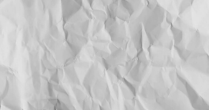 Animation of crumpled white paper moving on seamless loop