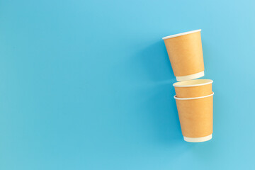 Stack of recyclable coffee paper cups, top view. Eco-friendly zero waste products