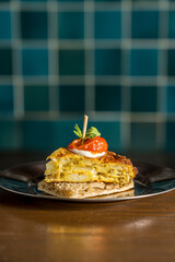 Potato omelette with cherry tomatoes ready to eat