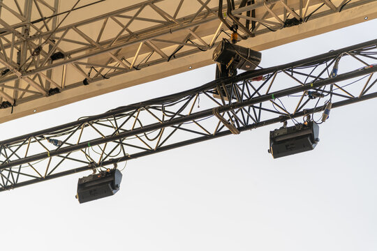 Outdoor aluminum concert stage frame parts and rigging mechanism elements designed for supporting and securing stage structures during events
