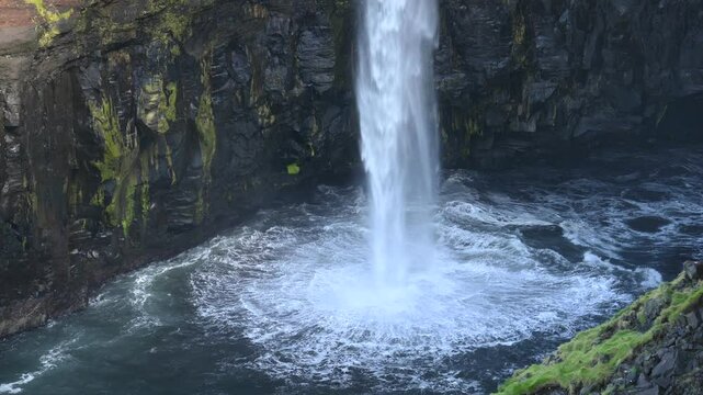 Mulafossur waterfall in Gasadalur village, Vagar Island of the Faroe Islands, Denmark. 