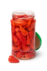 Glass jar with pickled  tiny red mexican tiny peppers isolated on white background close up