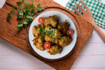 Spinach fritters, traditional Spanish tapa. Top view table.