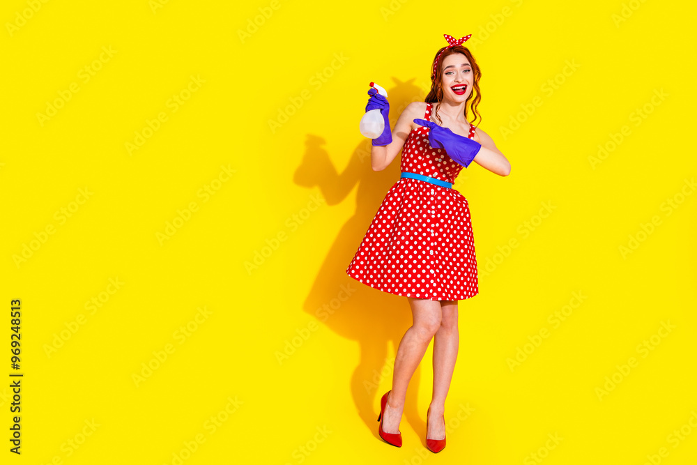 Canvas Prints Photo of cute lovely cheerful lady wear red dress showing bottle with water empty space isolated on yellow color background