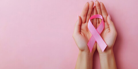 Symbolic Hands Holding Pink Ribbon for Breast Cancer Awareness
