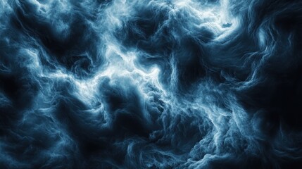 Obraz premium Abstract depiction of swirling blue and black clouds, evoking a sense of mystery and depth.