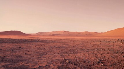 Fototapeta premium A barren Martian landscape showcasing red soil and distant hills under a pastel sky.