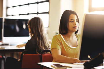 Office, reading and businesswoman with computer for typing, software and research info with technology. Coworking, thinking and web designer with digital for page update, review and application