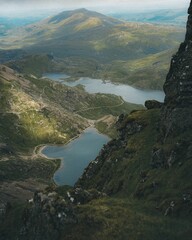 Stunning aerial view of Snowdonia National Park featuring rugged mountains and tranquil lakes