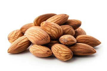 A pile of almonds on a white surface