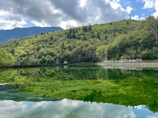 Fototapeta premium Small reservoir Plužna or Pluzensko lake, stream Gljun (Bovec, Slovenia) - Kleiner Stausee Pluzna, Bach Glijun (Bovec, Slowenien) - Akumulacijsko jezero Plužna or Plužensko jezero (Slovenija)