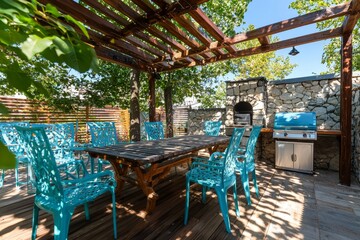 Fototapeta premium Blue plastic patio furniture on a rooftop deck