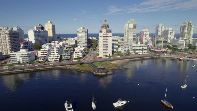 Aerial footage of the urban coastal buildings near Port of Punta del Este in Punta del Este, Uruguay
