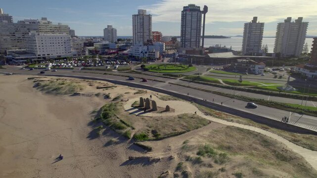 Aerial footage of the Los Dedos de Punta del Este on Brava Beach in Punta del Este, Uruguay