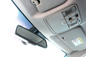 White ceiling with ceiling light and with adjustable panoramic sunroof in car. Automotive sunroof...