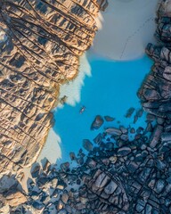 A person floating in a pristine blue water