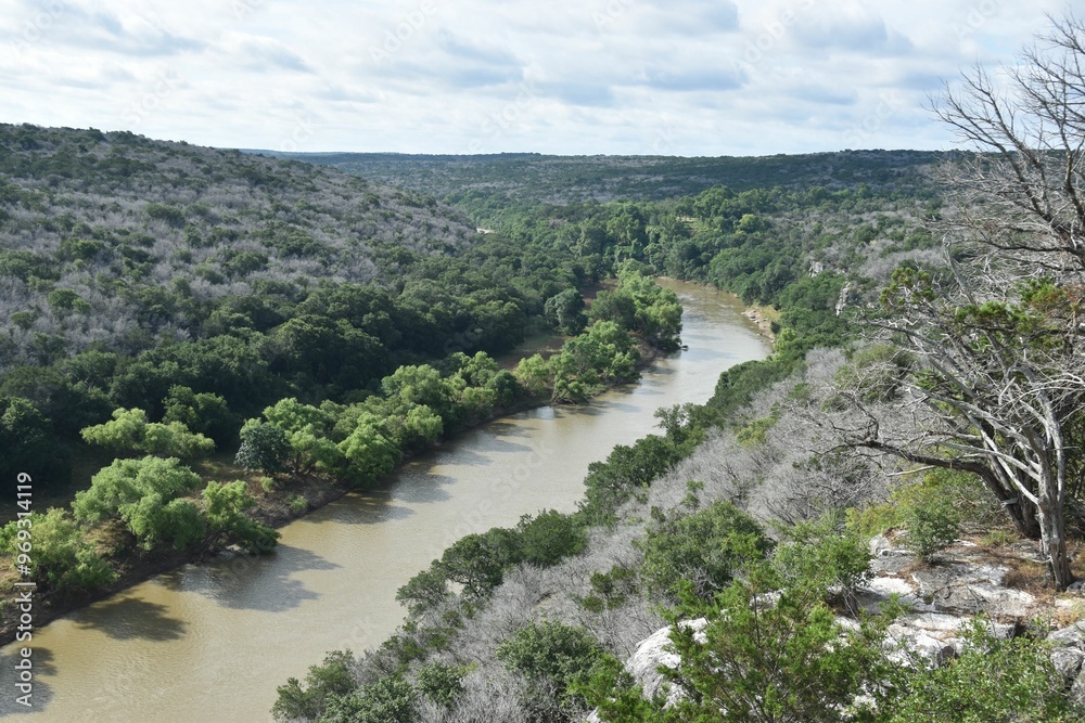 Canvas Prints Scenic view of a winding river through a lush green valley