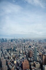 View of New York City skyline with skyscrapers and clear blue sky