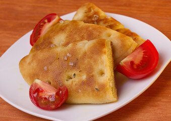toasted bread with olive oil and tomatoes, delicious white bread with olive oil and coarse salt and oregano, bread with olive oil, starter