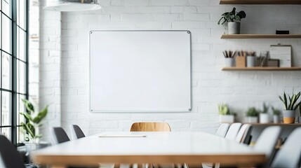 Clean whiteboard in an office setting, waiting for ideas to be drawn. Perfect for business brainstorming concepts.