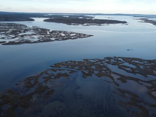 Fototapeta premium Aerial view of a serene coastal landscape with islands.