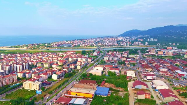 Aerial view a city with a river.