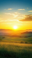 Breathtaking sunrise over rolling green hills with a serene blue sky and scattered clouds, creating a tranquil and picturesque landscape.