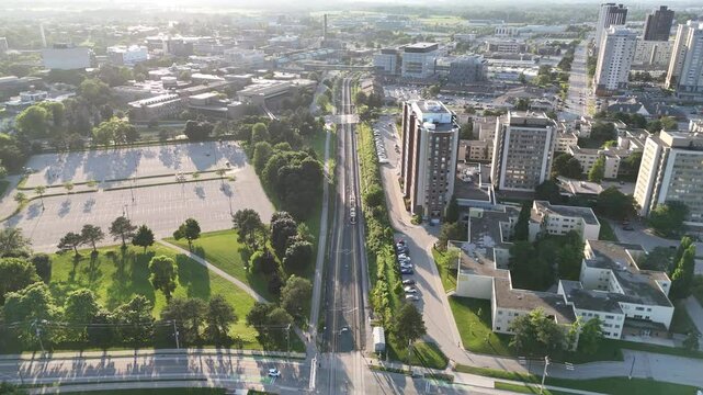 Aerial footage of the urban cityscape of Waterloo on a clear sunny day in Ontario Province, Canada