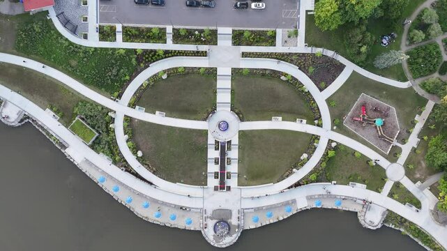 Aerial footage of the lakeside trails in Waterloo Park in Waterloo city, Ontario, Canada