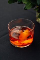 Old fashioned cocktail with orange peel