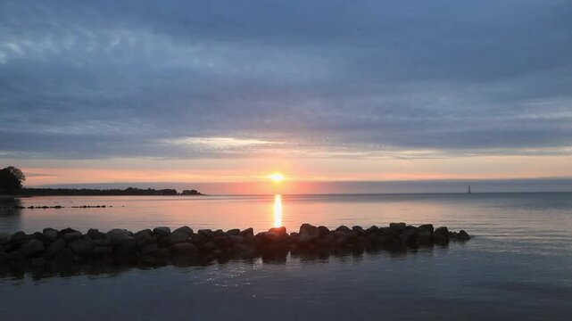 Tranquil seascape with rock groynes and ictuersque coastline as ocean videos concepts