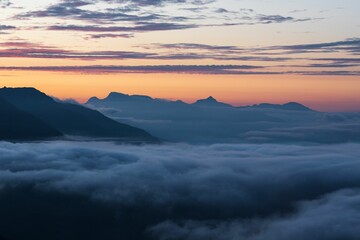 Summer landscape view of a cloud inversion at sunset