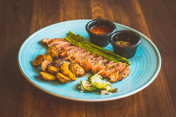  Irish duck breast Accompanied by crispy roasted baby potatoes and refreshing acar padang.  Served with rendang sauce and sambal ijo for that burst of flavour