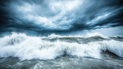 Obraz premium Lightning strikes illuminate the dark sky above a turbulent sea, where crashing waves and strong winds create an atmosphere of mystery and power