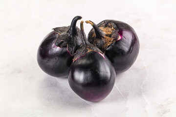 Raw violet and black eggplant