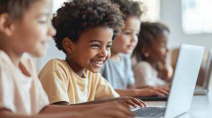 Smiling elementary students huddled together at their teacher's desk, focused on a laptop as they explore educational online programs during class. photo
