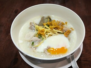 Hot pork porridge with soft-boiled eggs