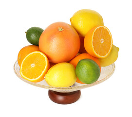 Glass vase with different fresh fruits isolated on white
