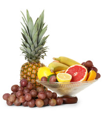 Glass vase with different fresh fruits isolated on white