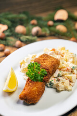 Christmas fried carp with potato salad
