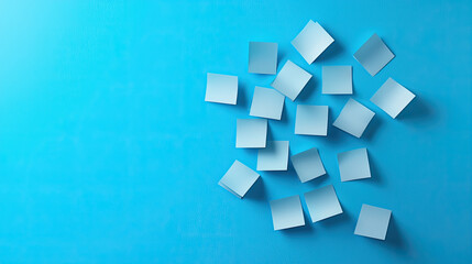 Fototapeta premium Collection of blank sticky notes on a vibrant blue background, perfect for planning, organizing, or brainstorming ideas.