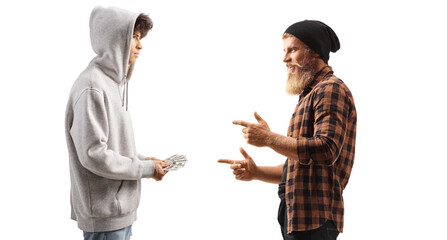 Two guys holding money and talking